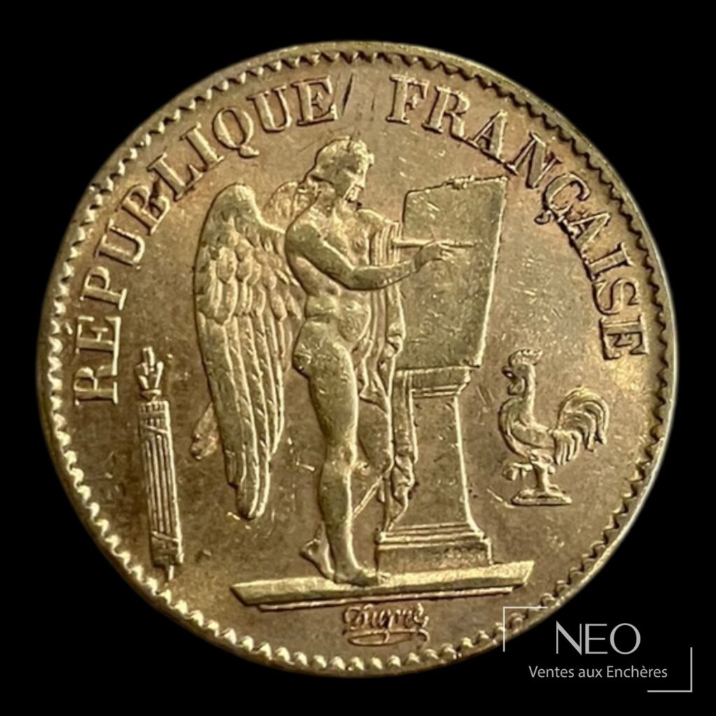 Face d'une pièce de 20 francs Génie ailé avec la figure du Génie et la mention République française