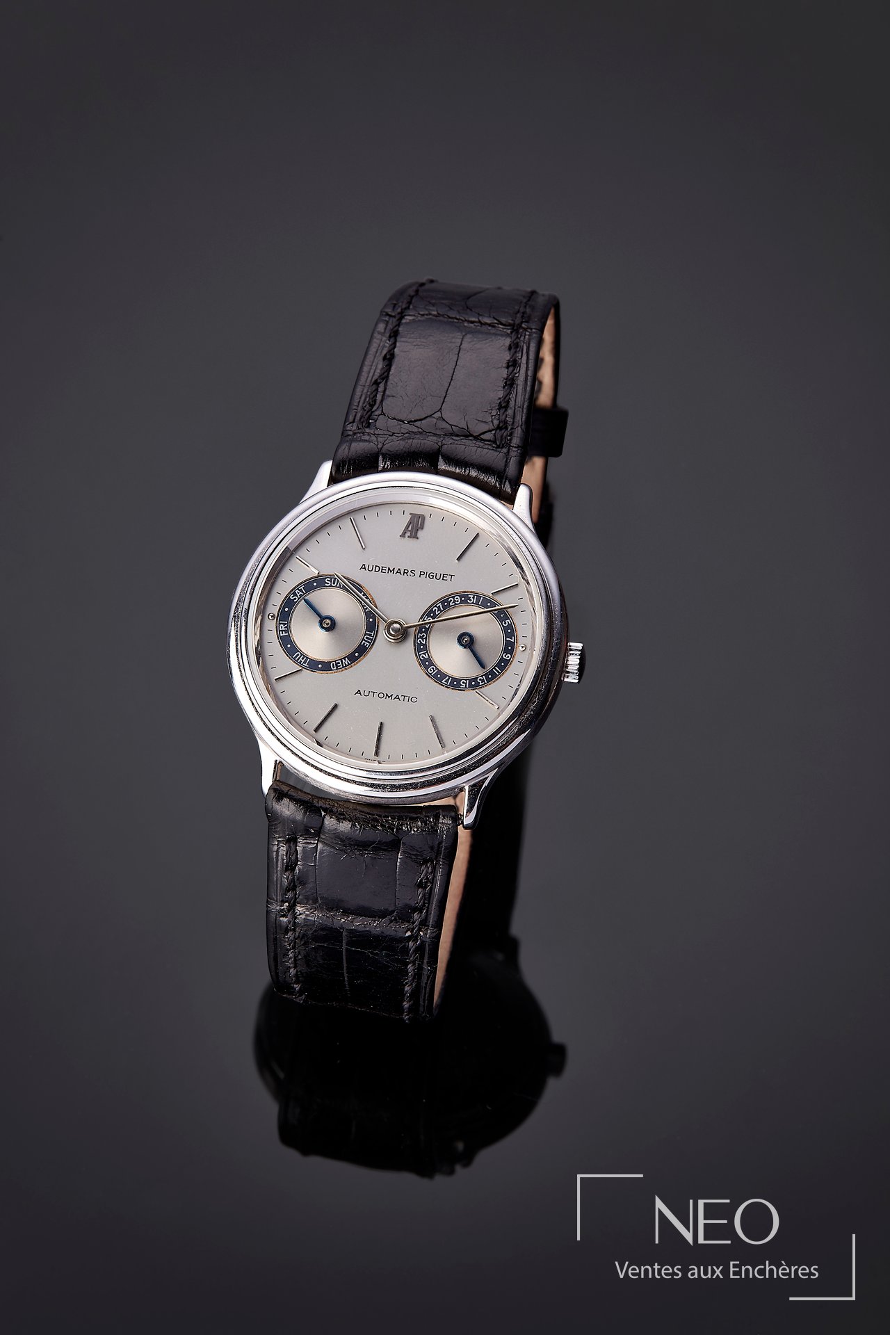 Montre Audemars Piguet Day Date en or gris