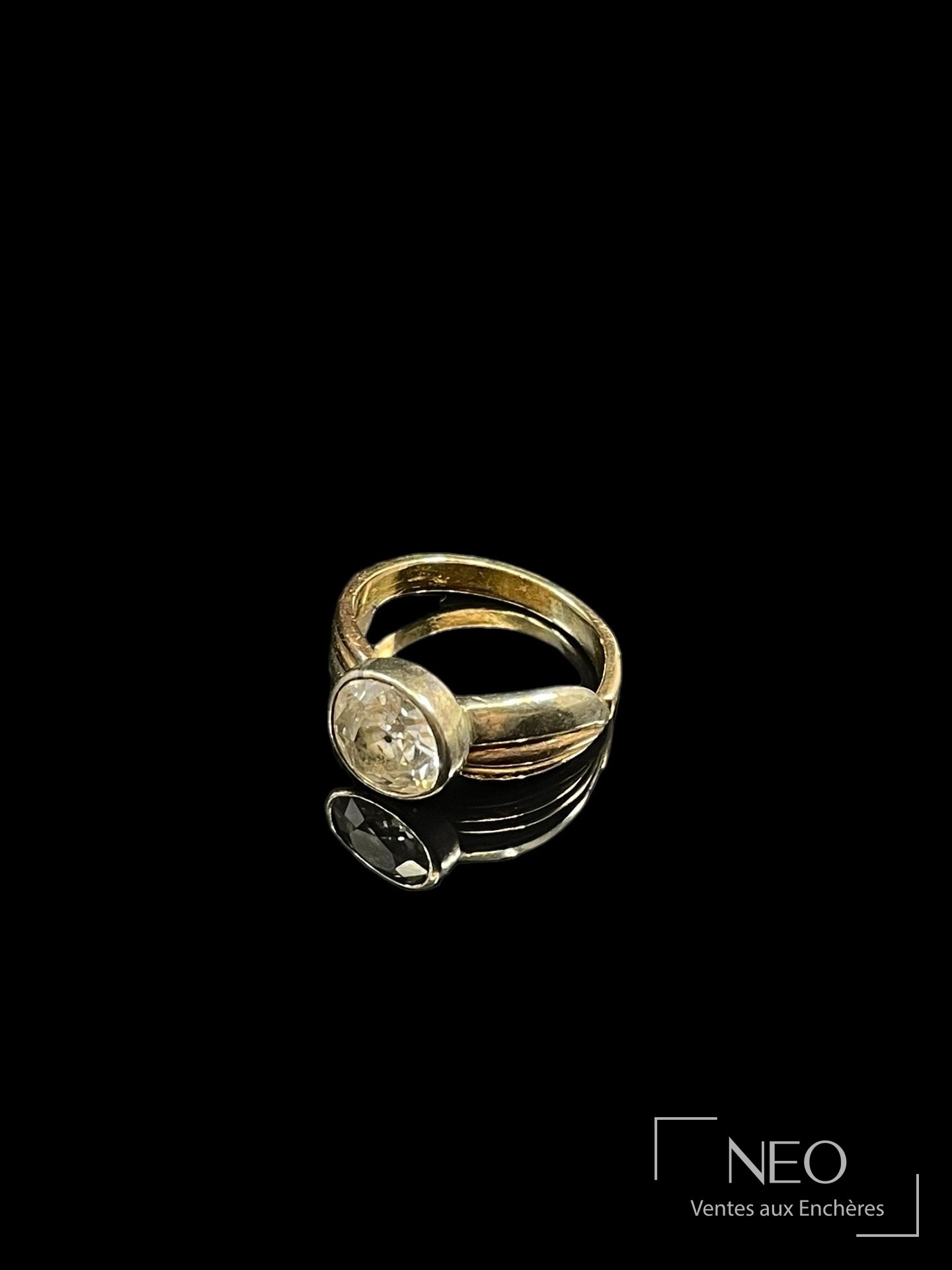 Bague en ors rose et gris 18 carats ornée d’un diamant ancien
