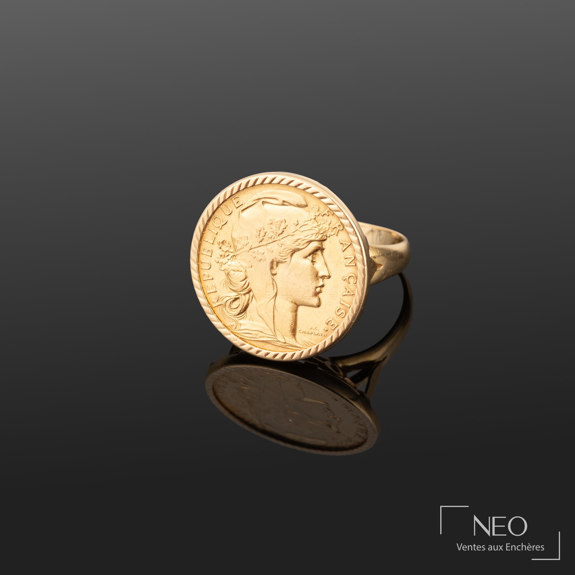 Bague en or jaune 18K retenant une pièce de 20 Francs Marianne au coq, 1913