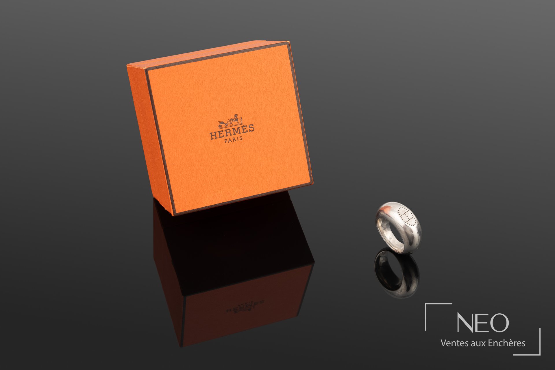 Bague Hermès en argent avec H perforé