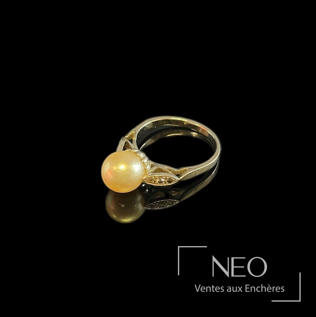 Bague en or gris et platine, perle de culture blanche et diamants
