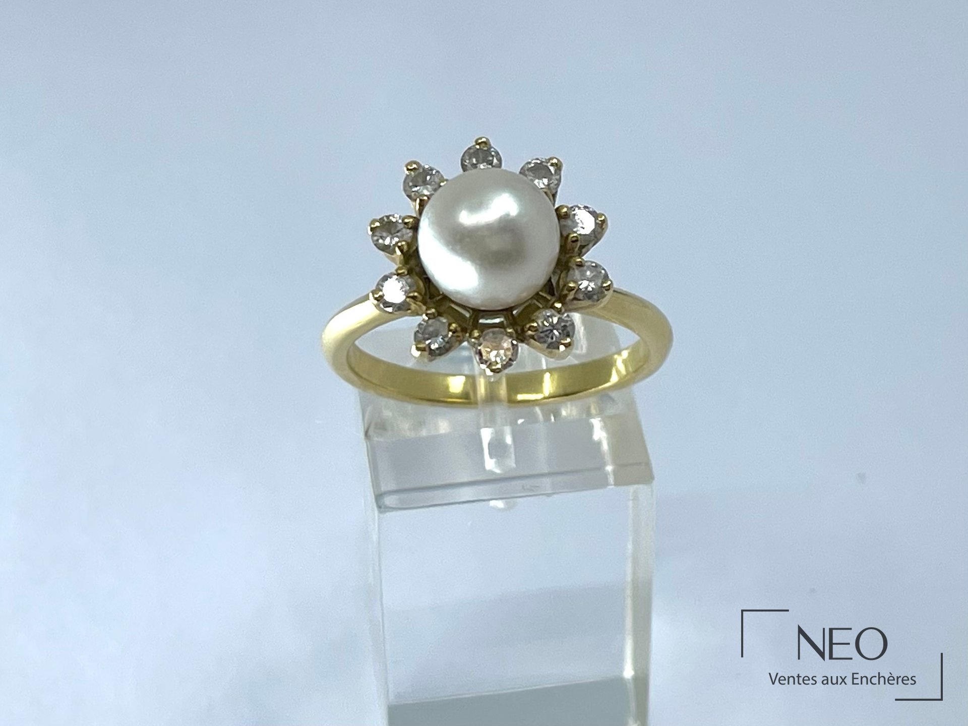 Bague en or jaune 18 carats à perle de culture et diamants