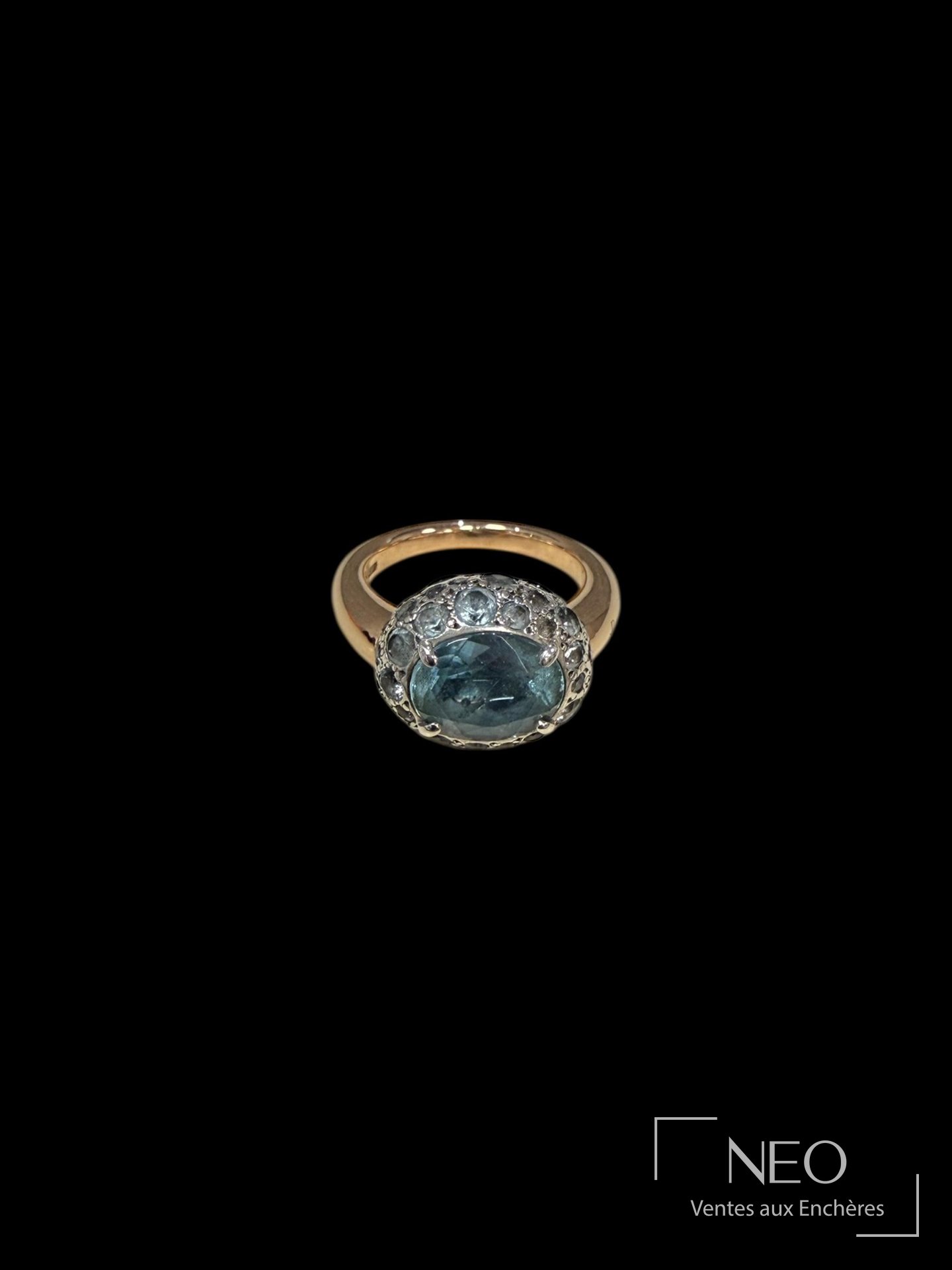 Bague Pomellato Tabou en or rose 18 carats et argent, topazes bleues