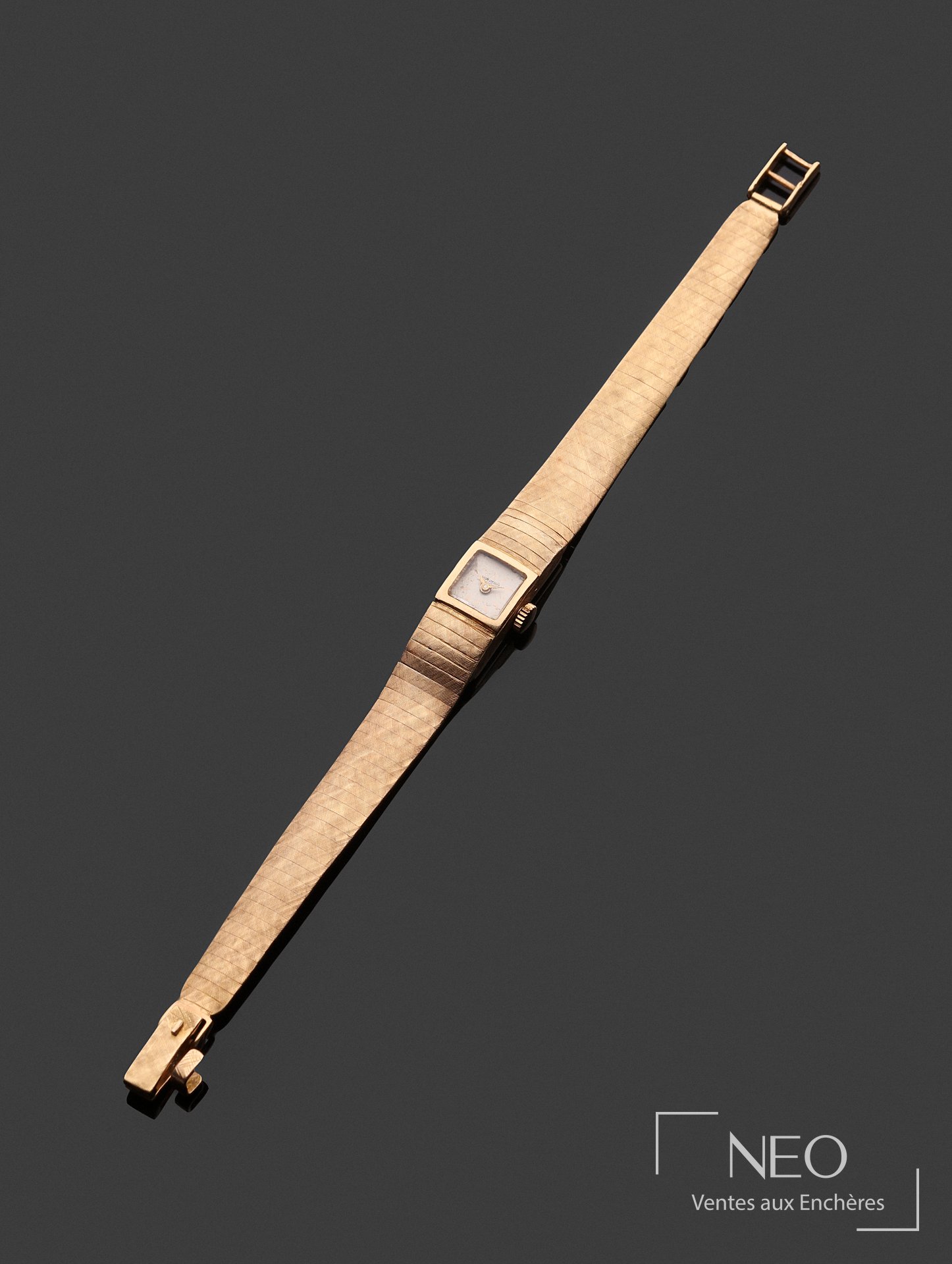Baume et Mercier montre-bracelet rectangulaire en or jaune 18 carats