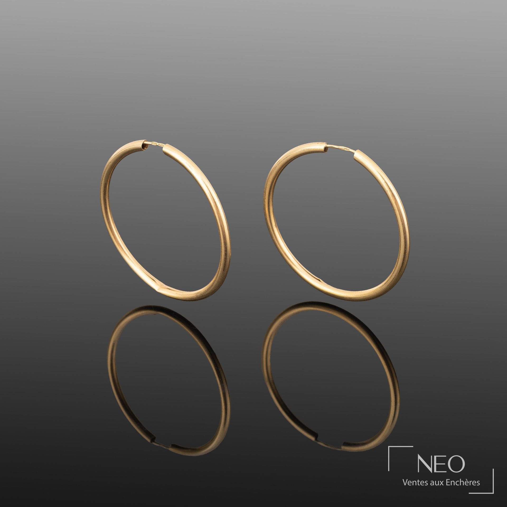 Boucles d’oreilles créoles en or jaune 18K