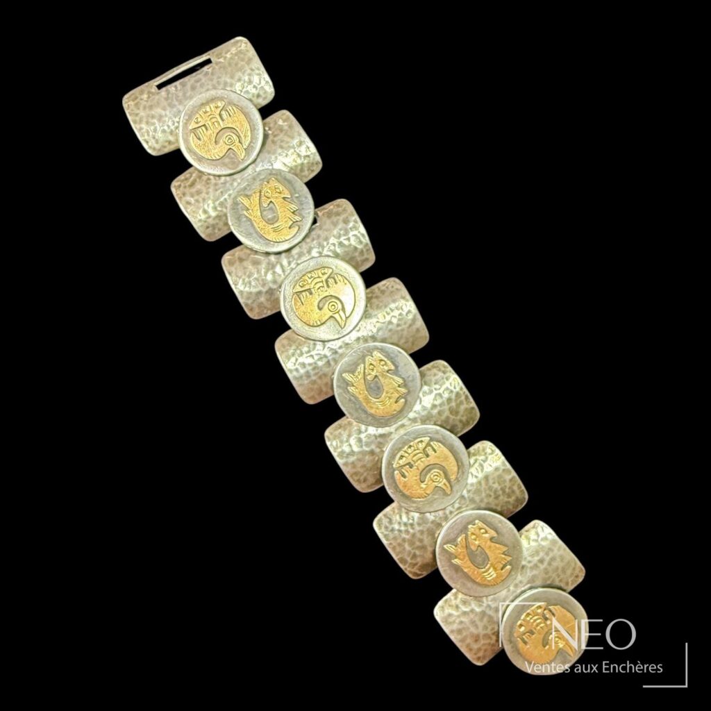 Bracelet articulé en argent et or