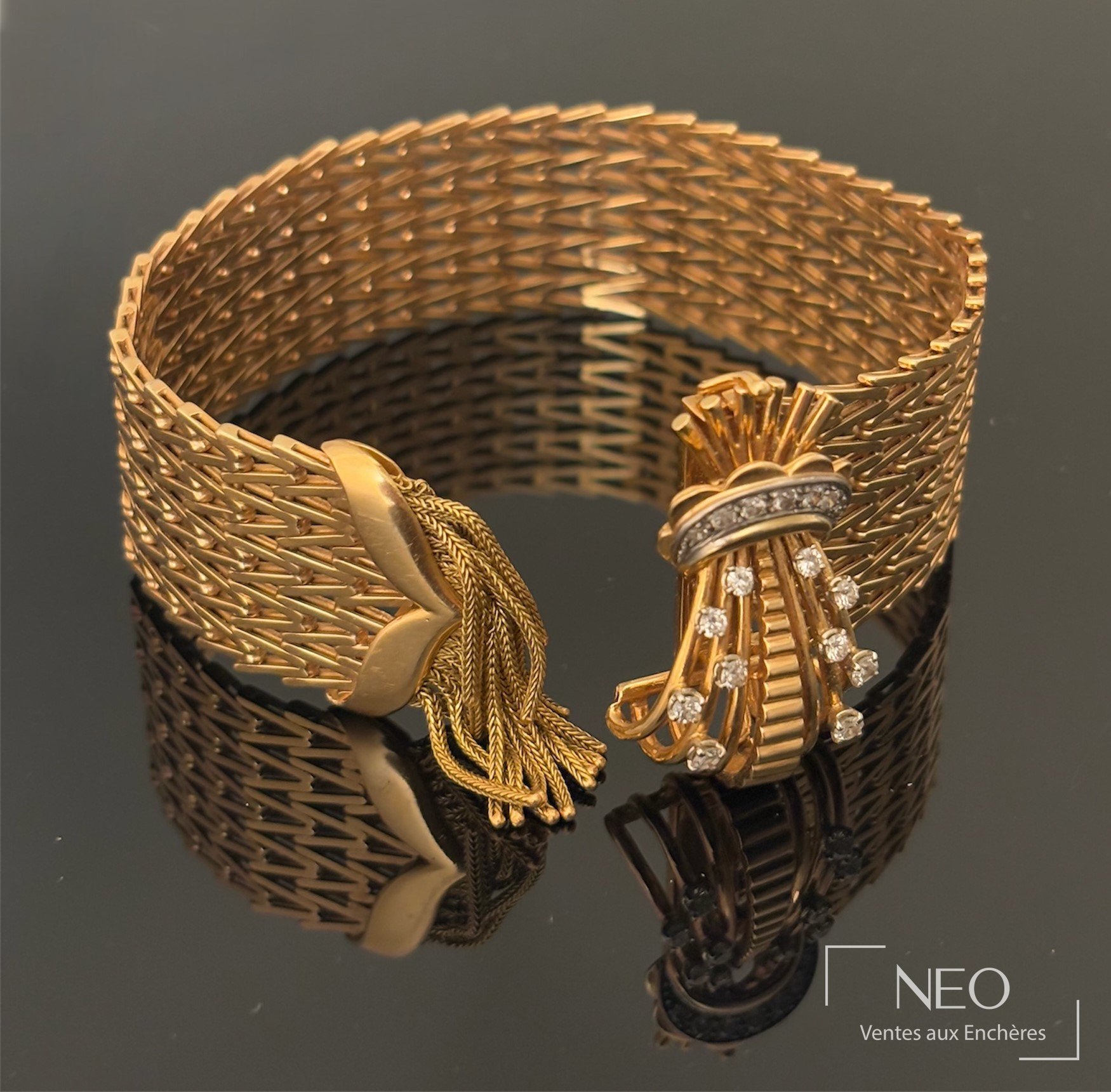 Bracelet articulé en or rose et or jaune 18 carats, mailles chevrons souples