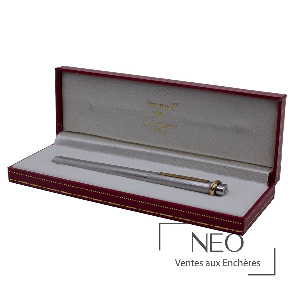 Cartier stylo bille Trinity en métal argenté et laiton doré