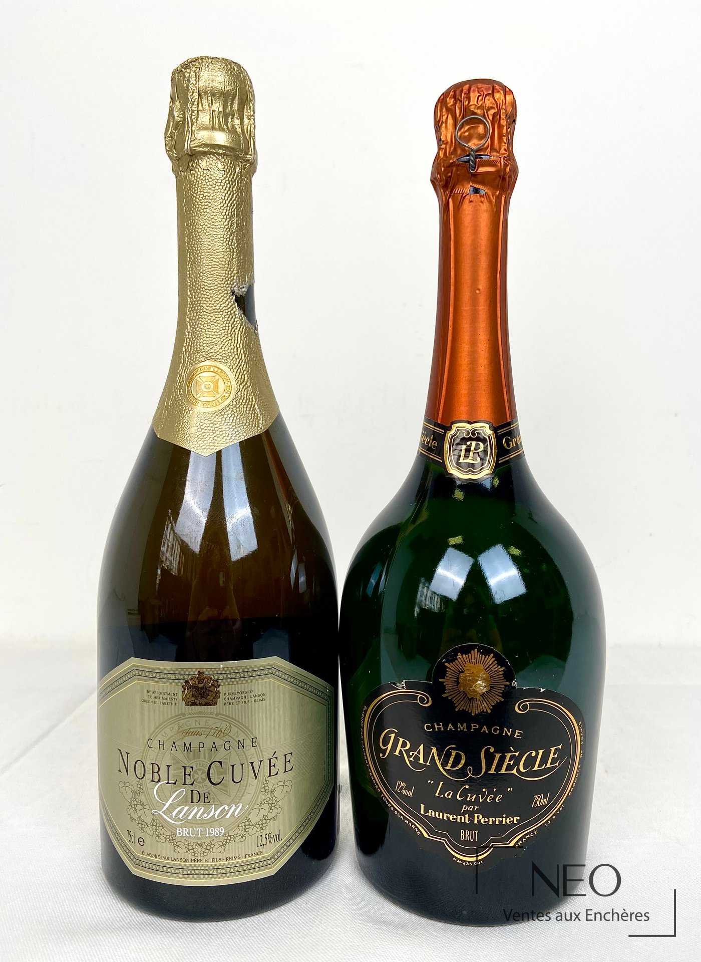 Ensemble de deux bouteilles de champagne Laurent-Perrier et Lanson