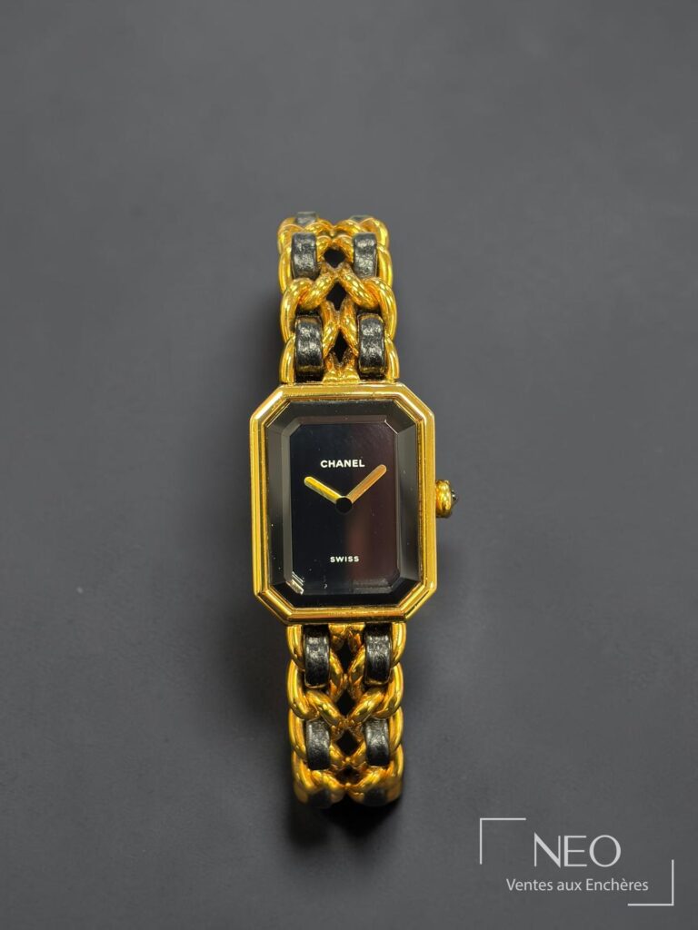 Montre CHANEL Première au cadran noir et bracelet chaîne bicolore