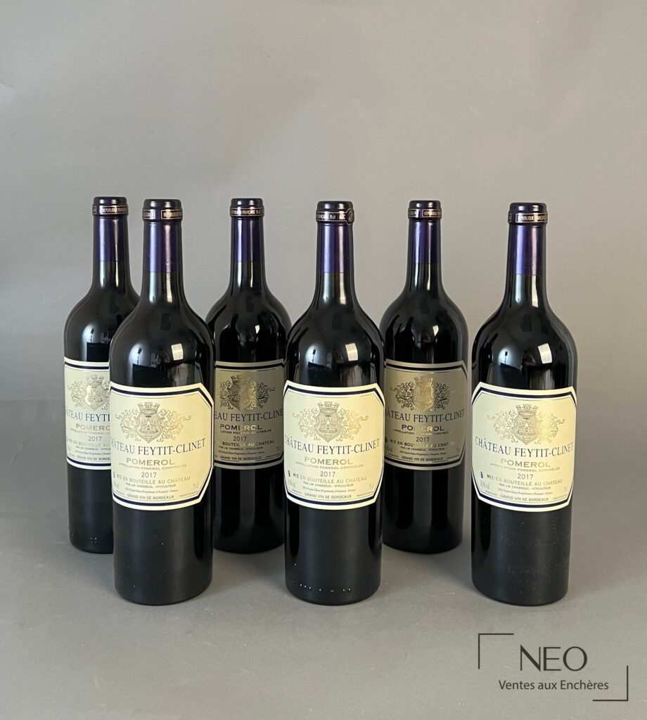 Six bouteilles de Château Feytit-Clinet Pomerol 2017 alignées de face