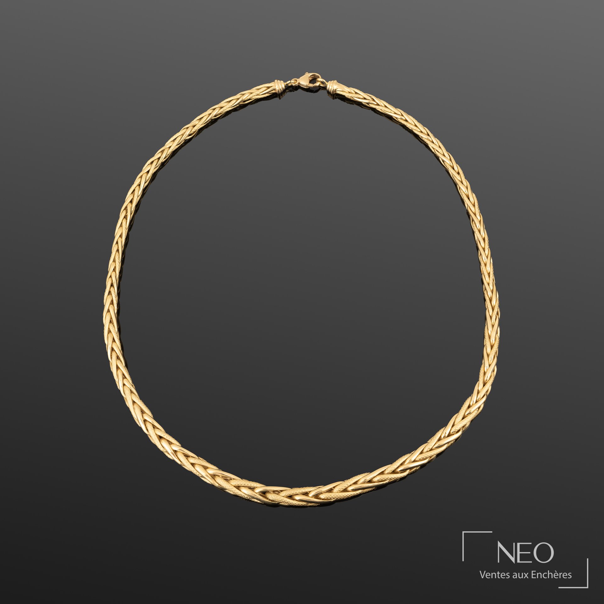 Collier en or jaune 18K à maille palmier, fermoir mousqueton