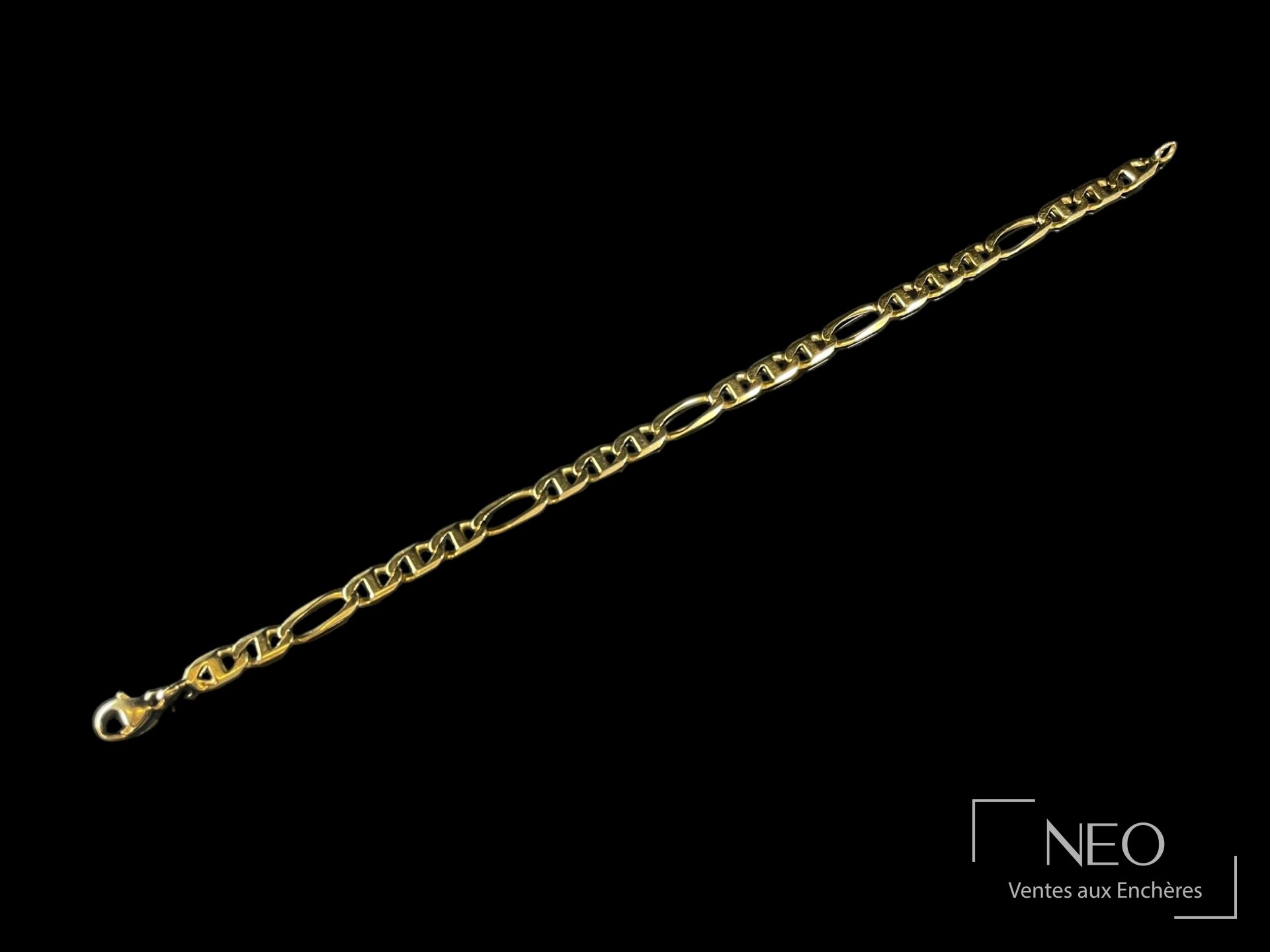 Collier en or jaune 18 carats à mailles ajourées et noeuds godronnés