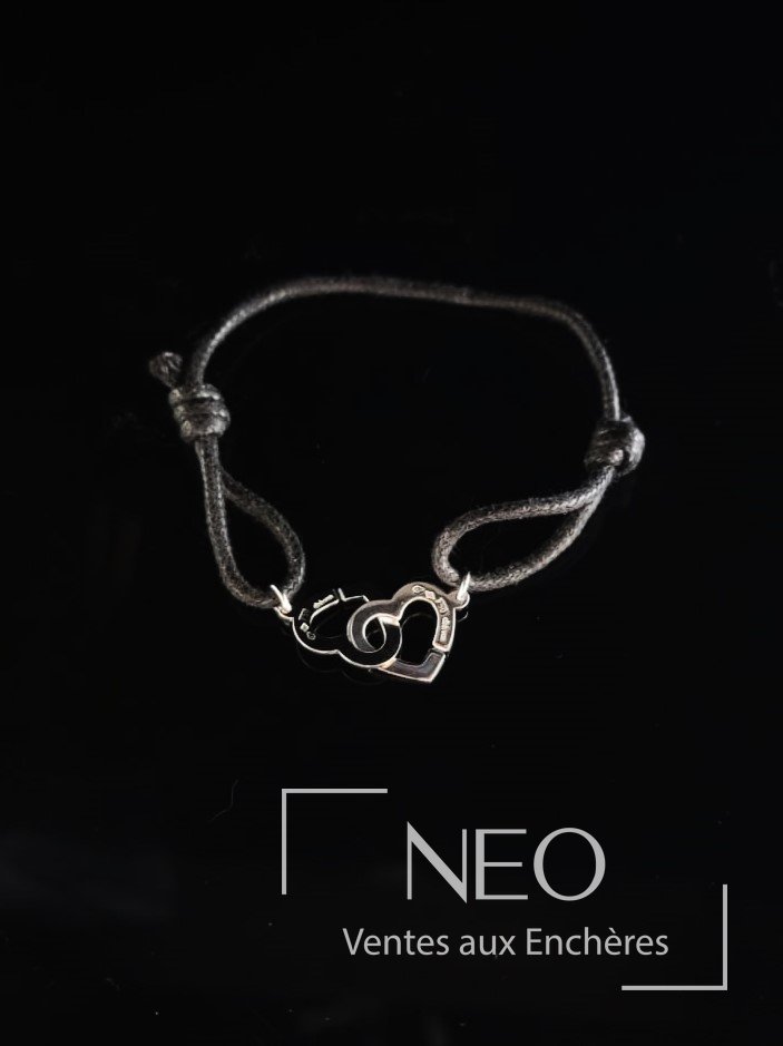 Dinh Van Bracelet lien Deux coeurs entrelacés en or gris 18 carats
