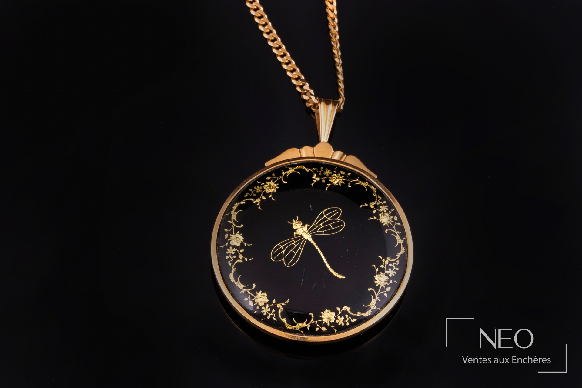 Ensemble chaîne gourmette et pendentif-broche en or jaune 18 carats