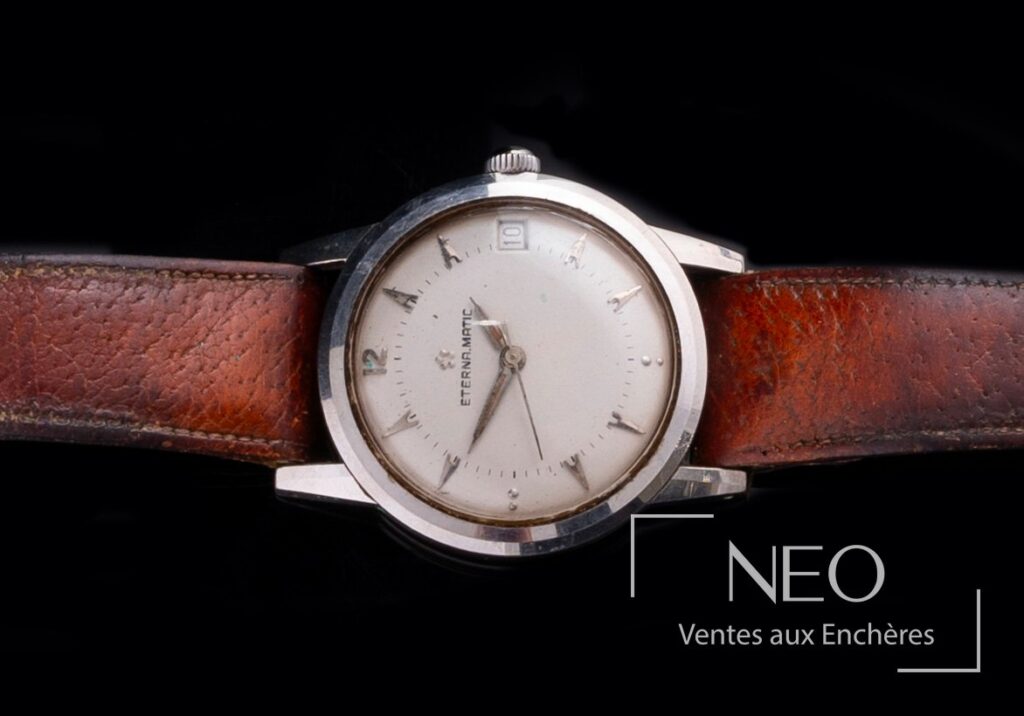 Montre Eterna Matic ronde avec cadran argenté et bracelet cuir brun