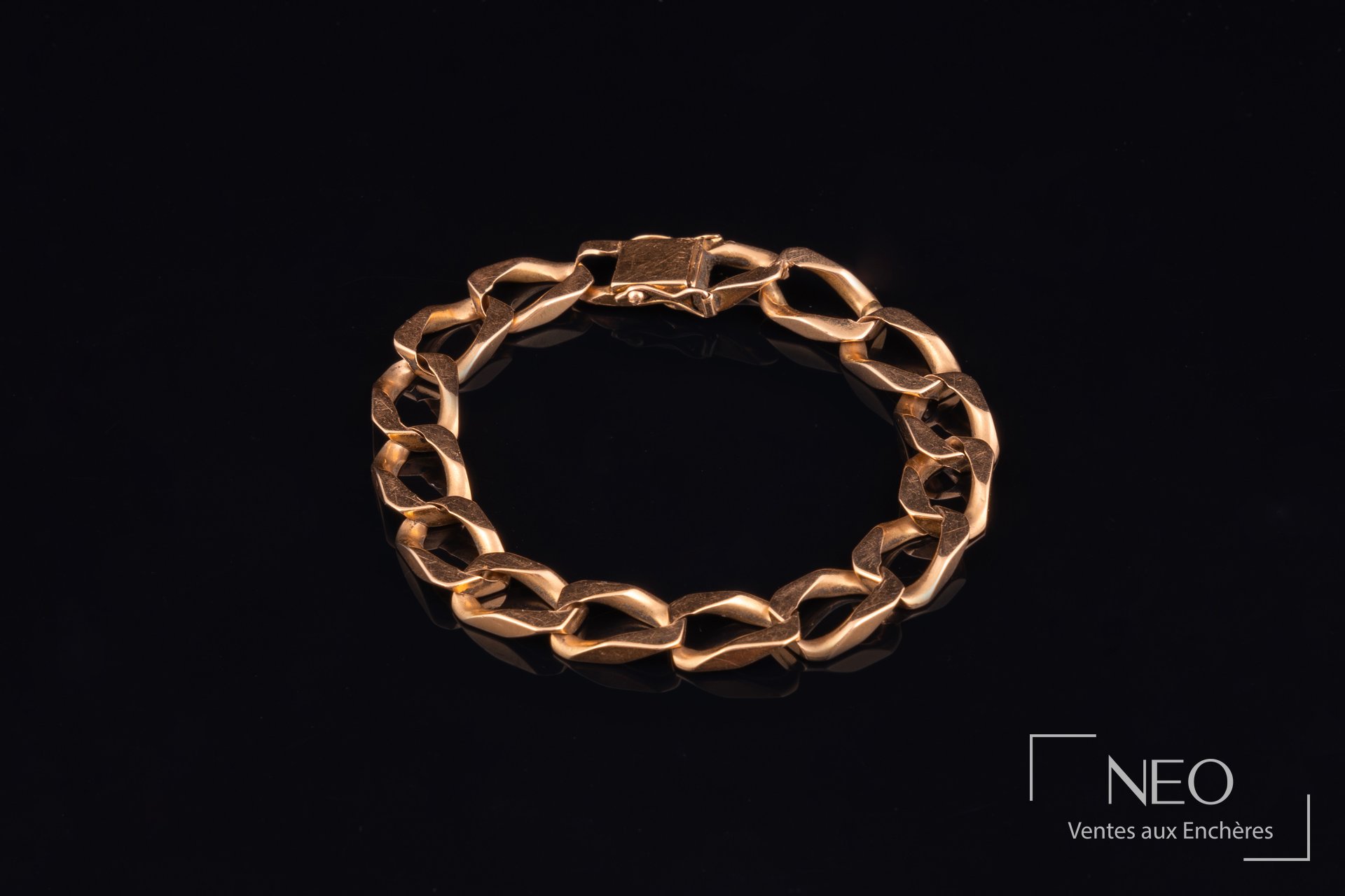 Gourmette en or jaune 18 carats, fermoir cliquet