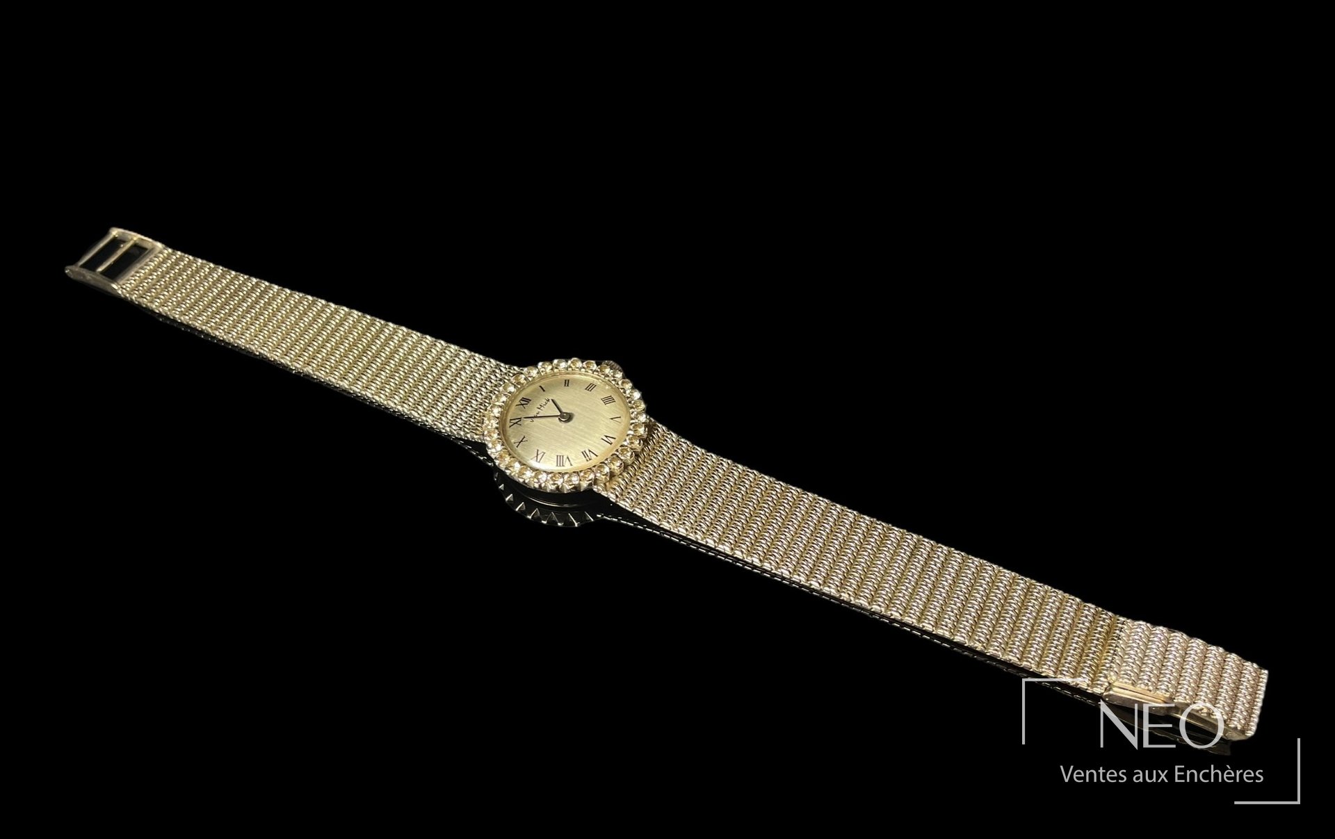 Jean MICK montre-bracelet en or gris 18 carats sertie de diamants