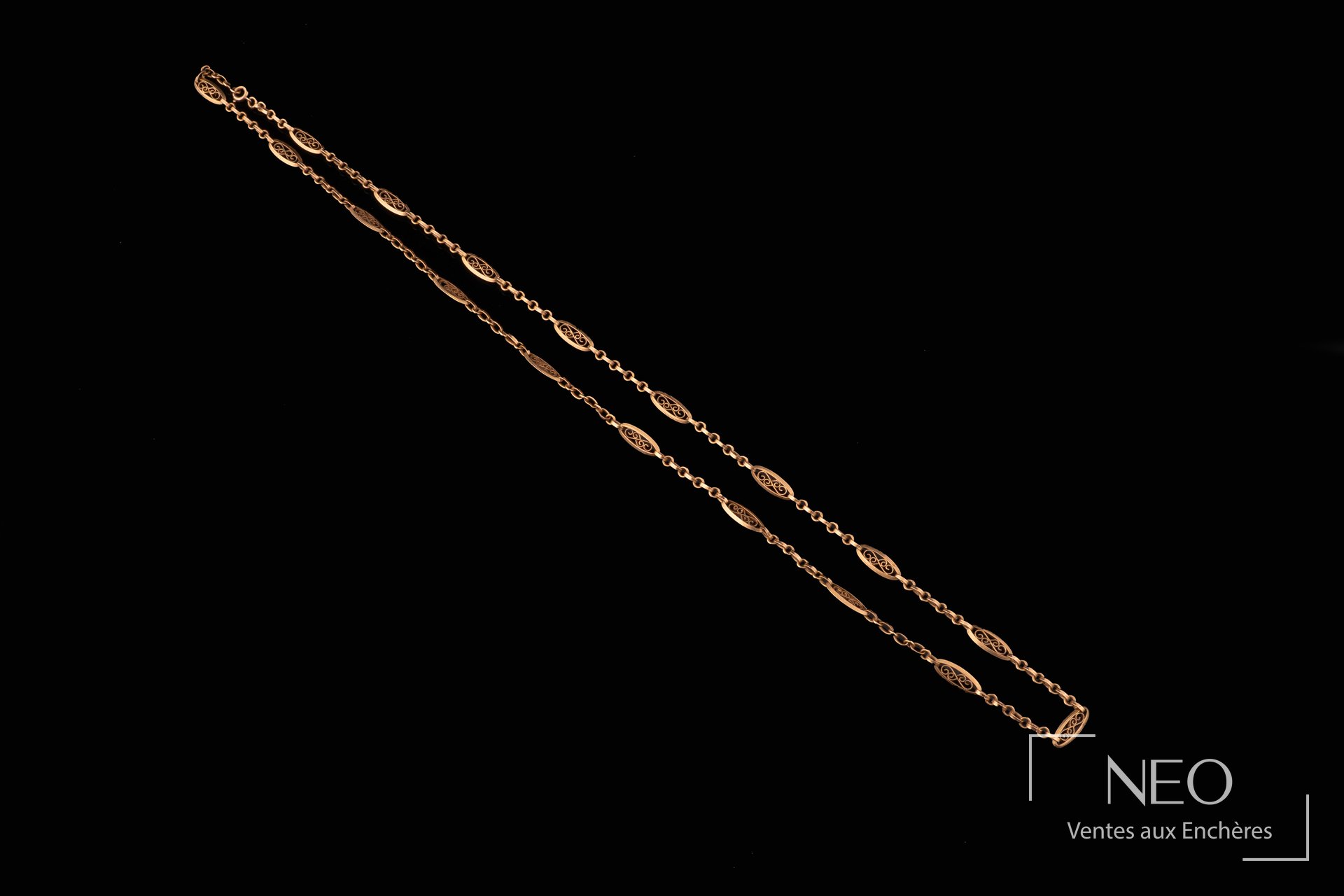 Long collier en or jaune 18 carats à maille filigrane