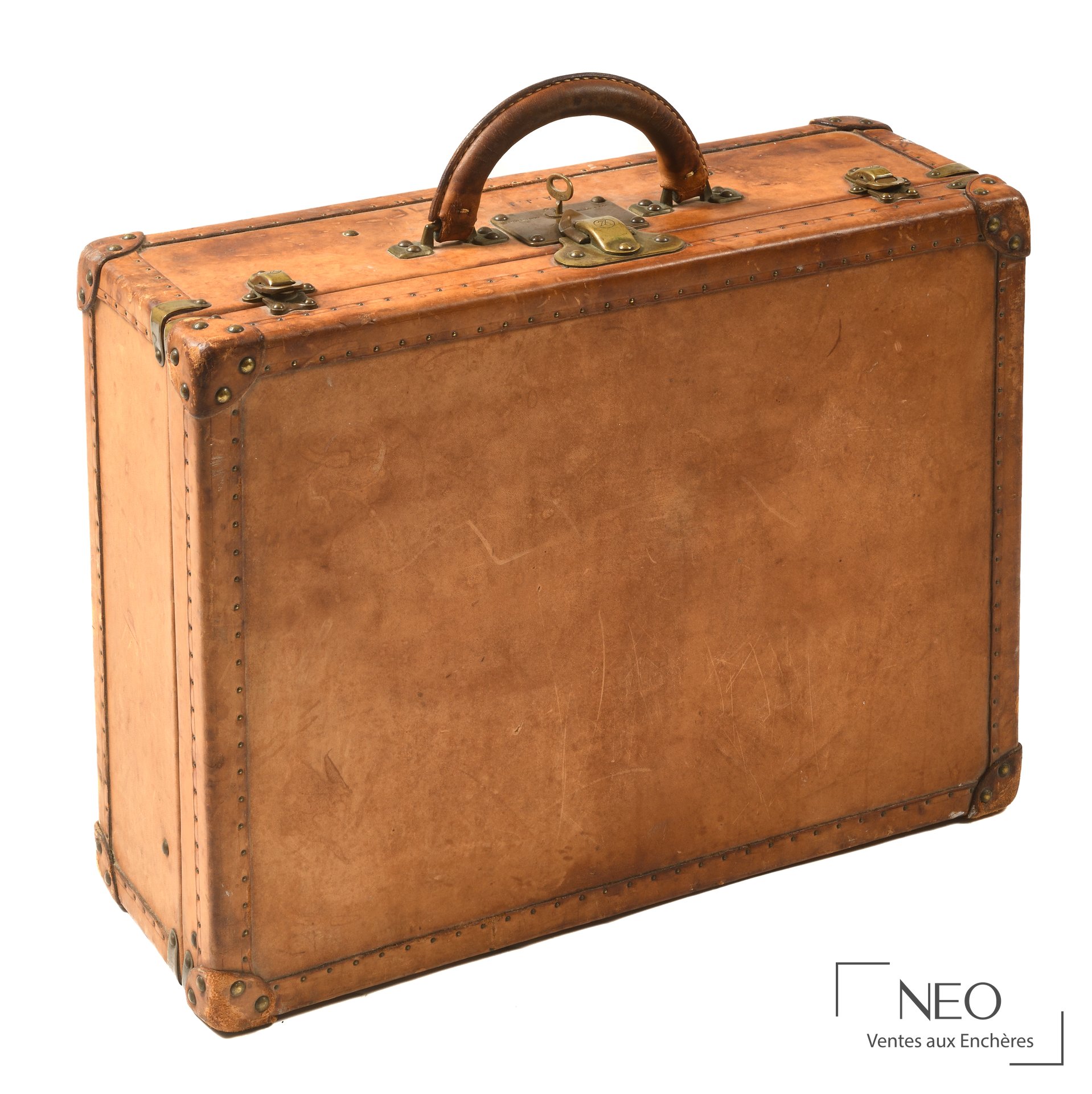 Valise Louis Vuitton en cuir ancien