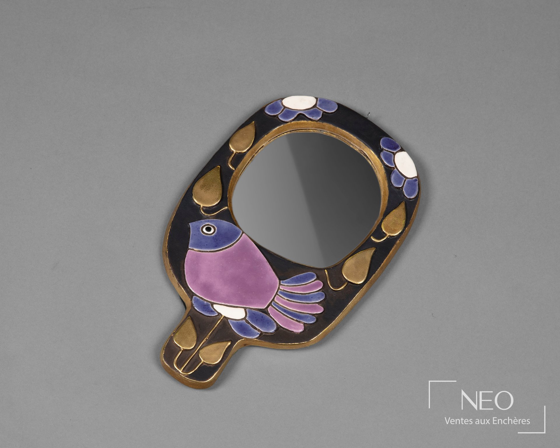 Miroir face à main Mithé Espelt en céramique émaillée polychrome avec oiseau stylisé