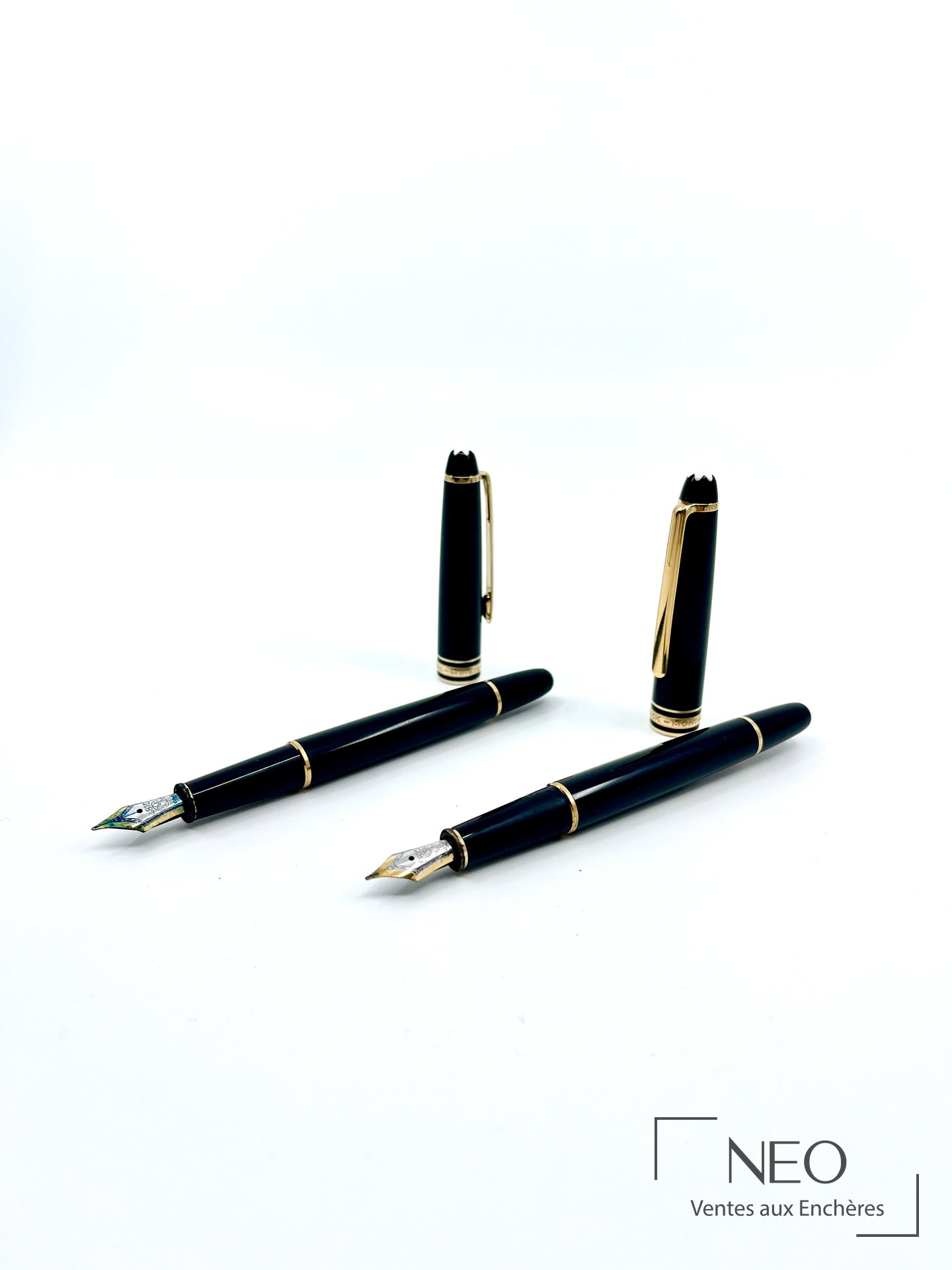 Montblanc Meisterstück, lot de deux stylos plume en résine noire et métal doré