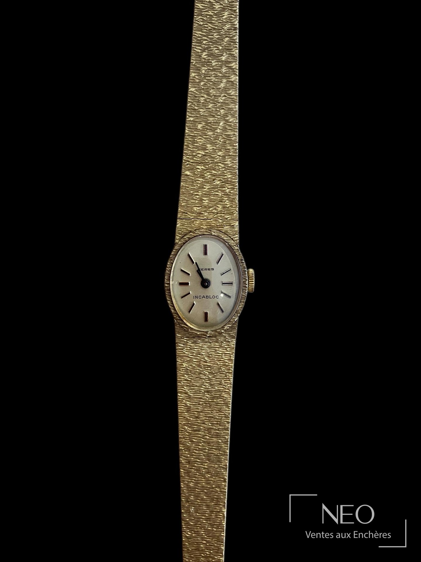 Montre bracelet CERES en or jaune 18 carats, cadran champagne doré