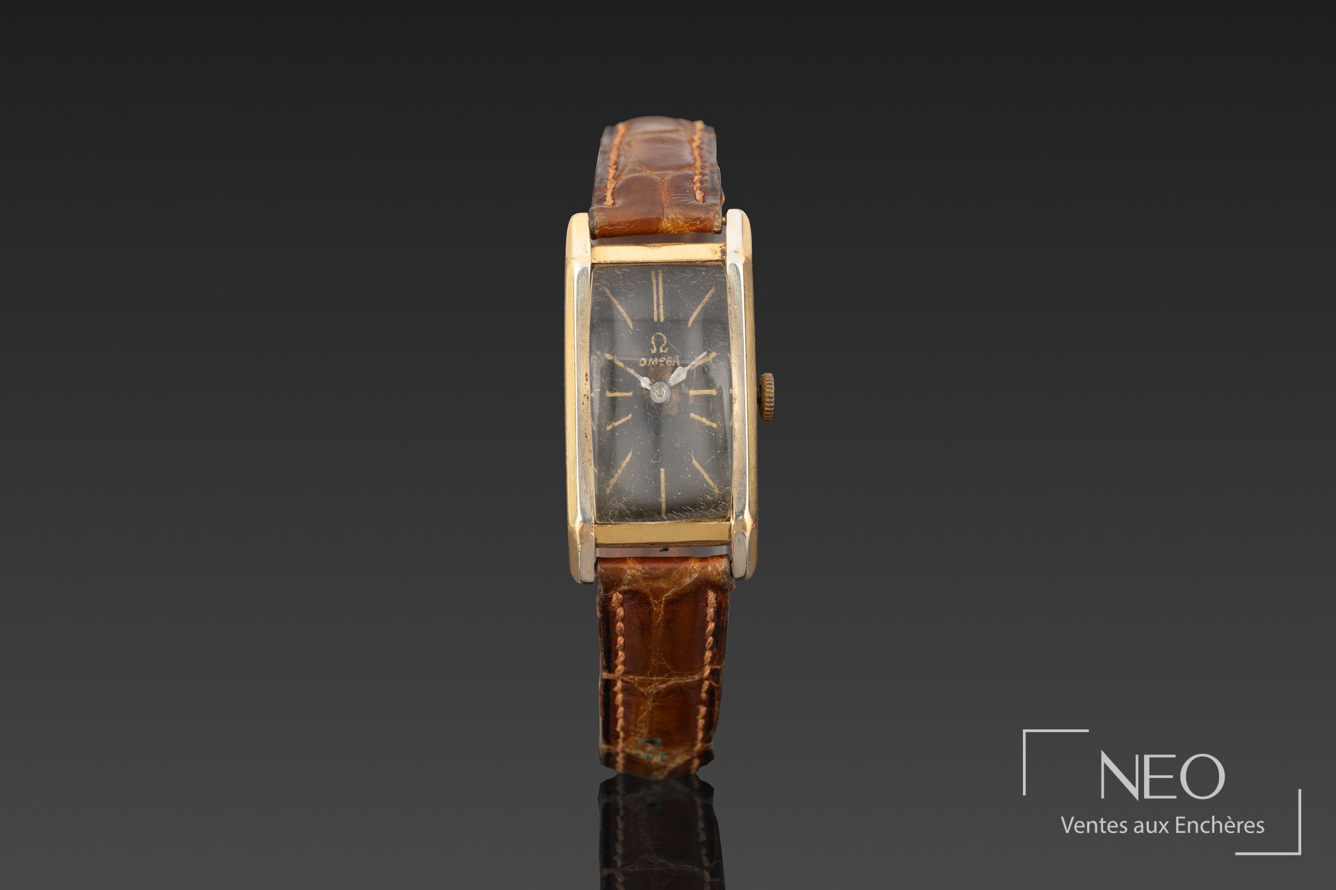 Montre bracelet Omega en or jaune 18 carats, cadran rectangulaire