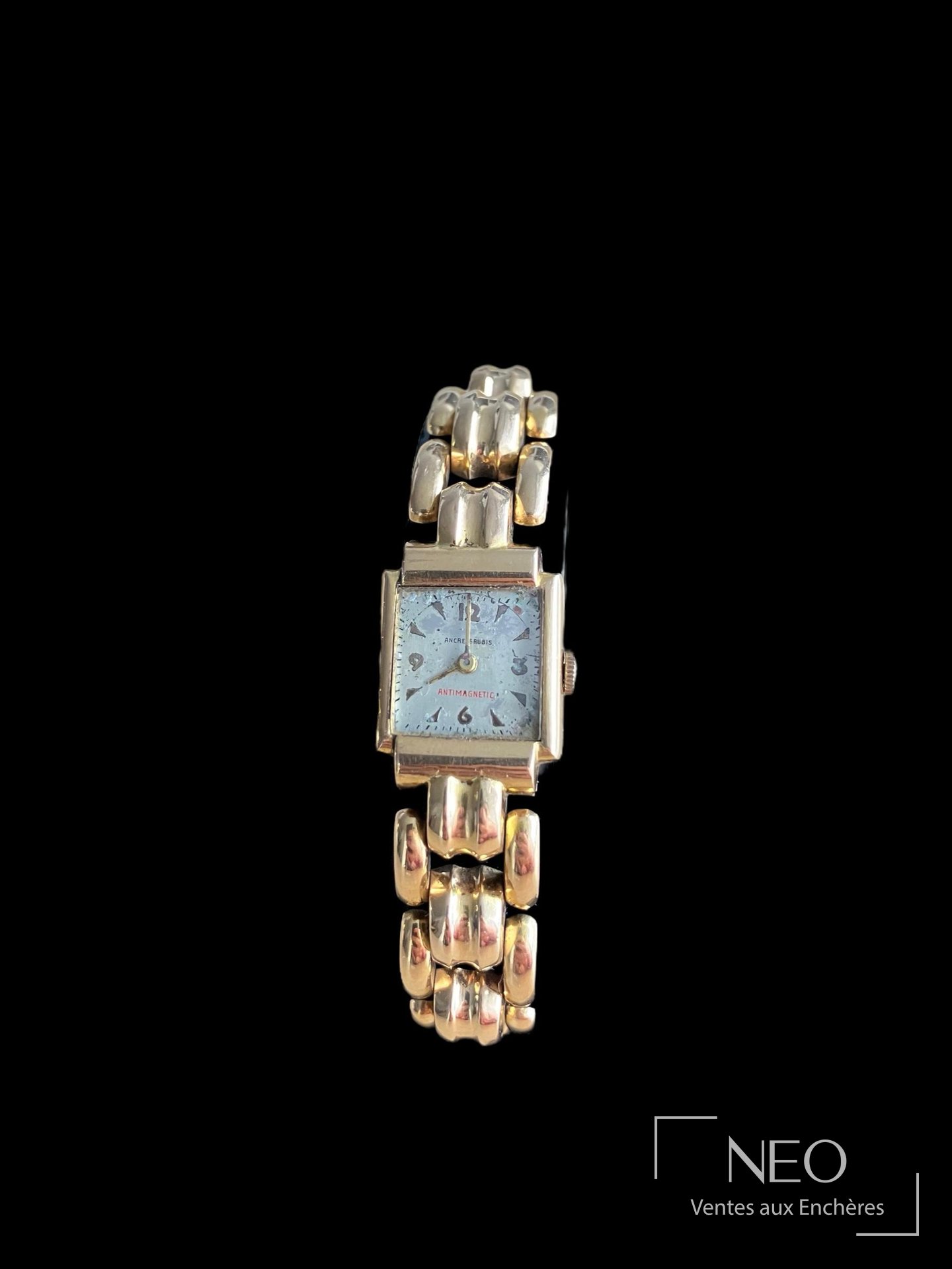 Montre bracelet en or jaune 18 carats à cadran rectangulaire