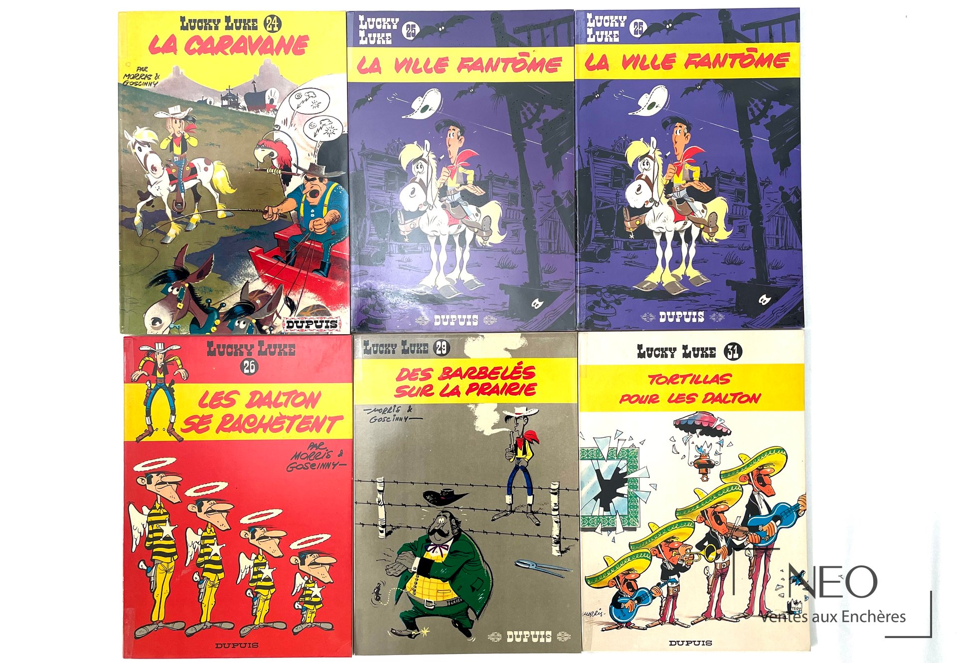Six volumes Lucky Luke de Morris en réédition plat bois