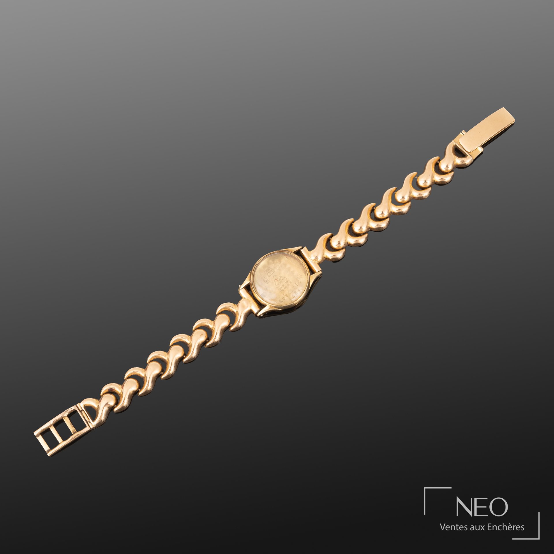 Montre-bracelet Omega en or jaune 18K avec cadran gris et bracelet à maille fantaisie