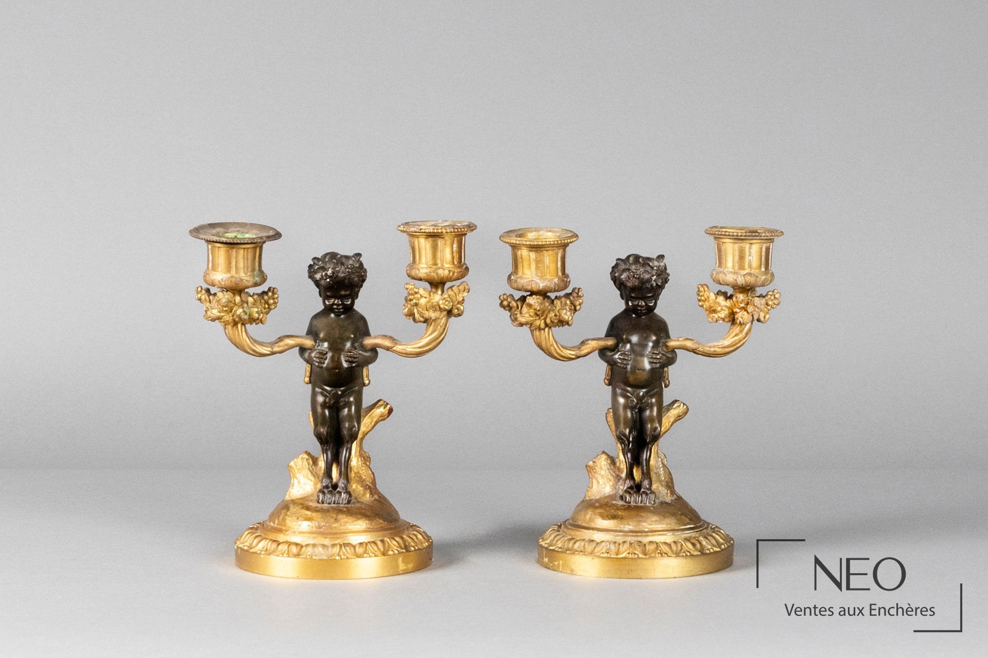 Paire de candélabres en bronze patiné et doré, époque Napoléon III