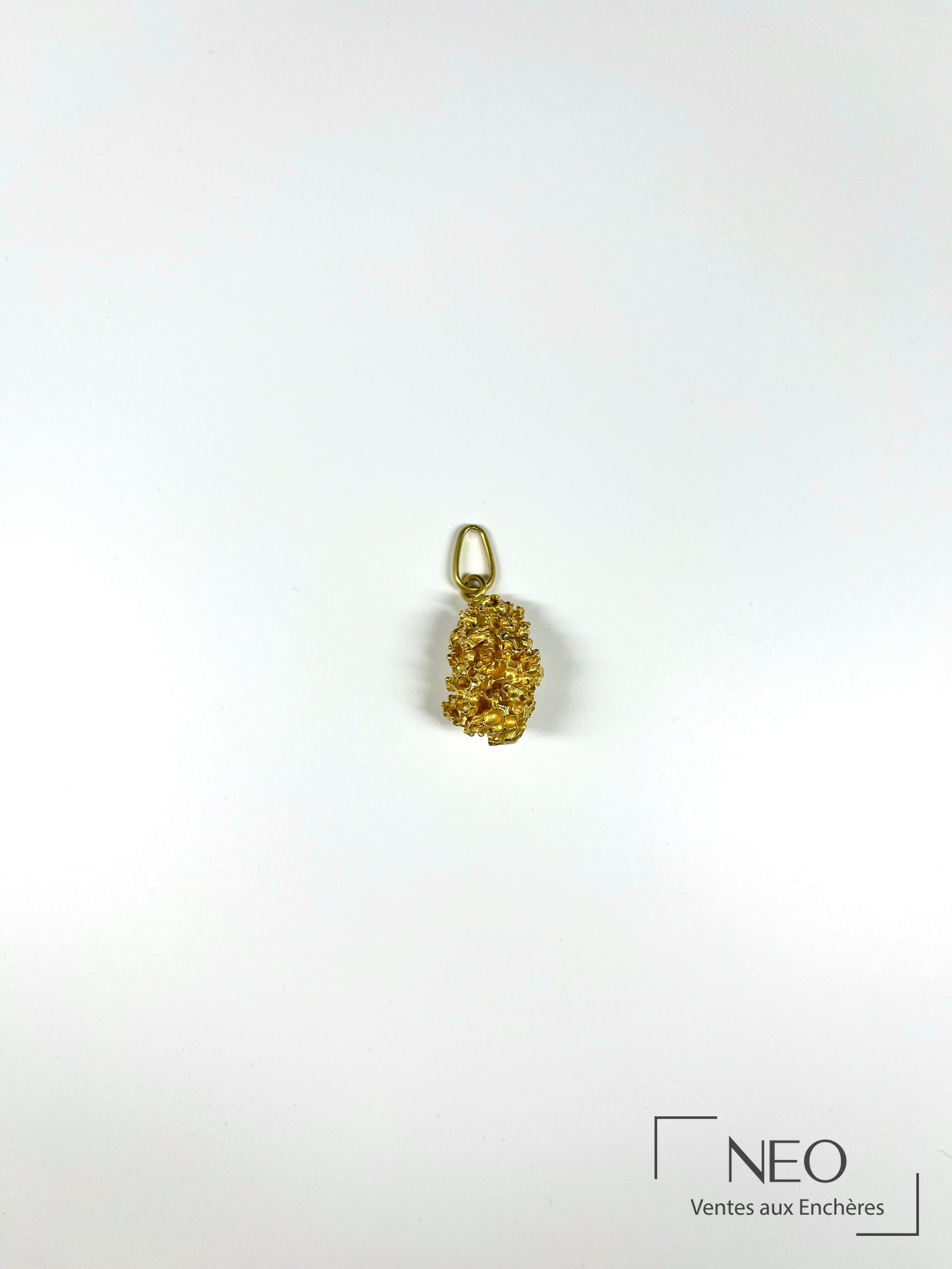 Pendentif pépite en or jaune 18 carats