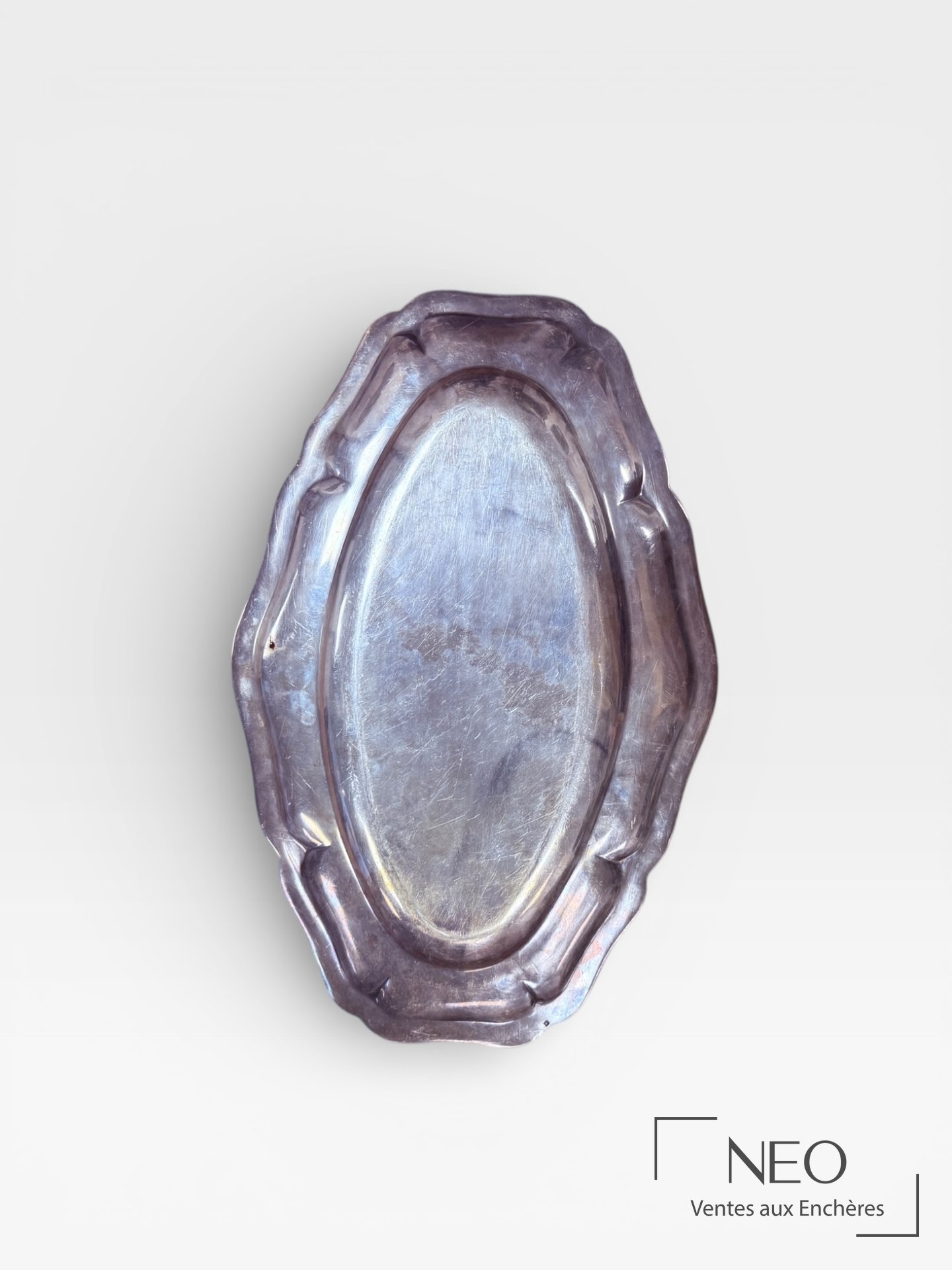 Plat ovale chantourné en argent 925/1000 et plat en métal argenté