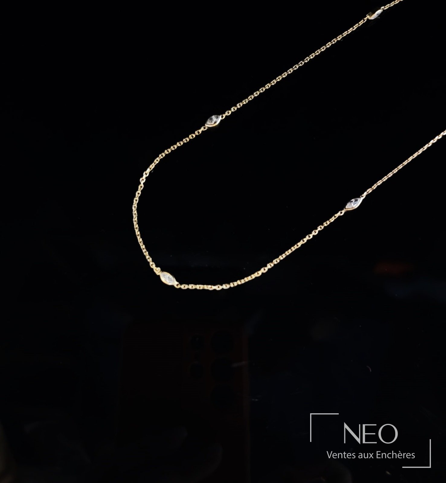 Sautoir en or jaune 18 carats et diamants
