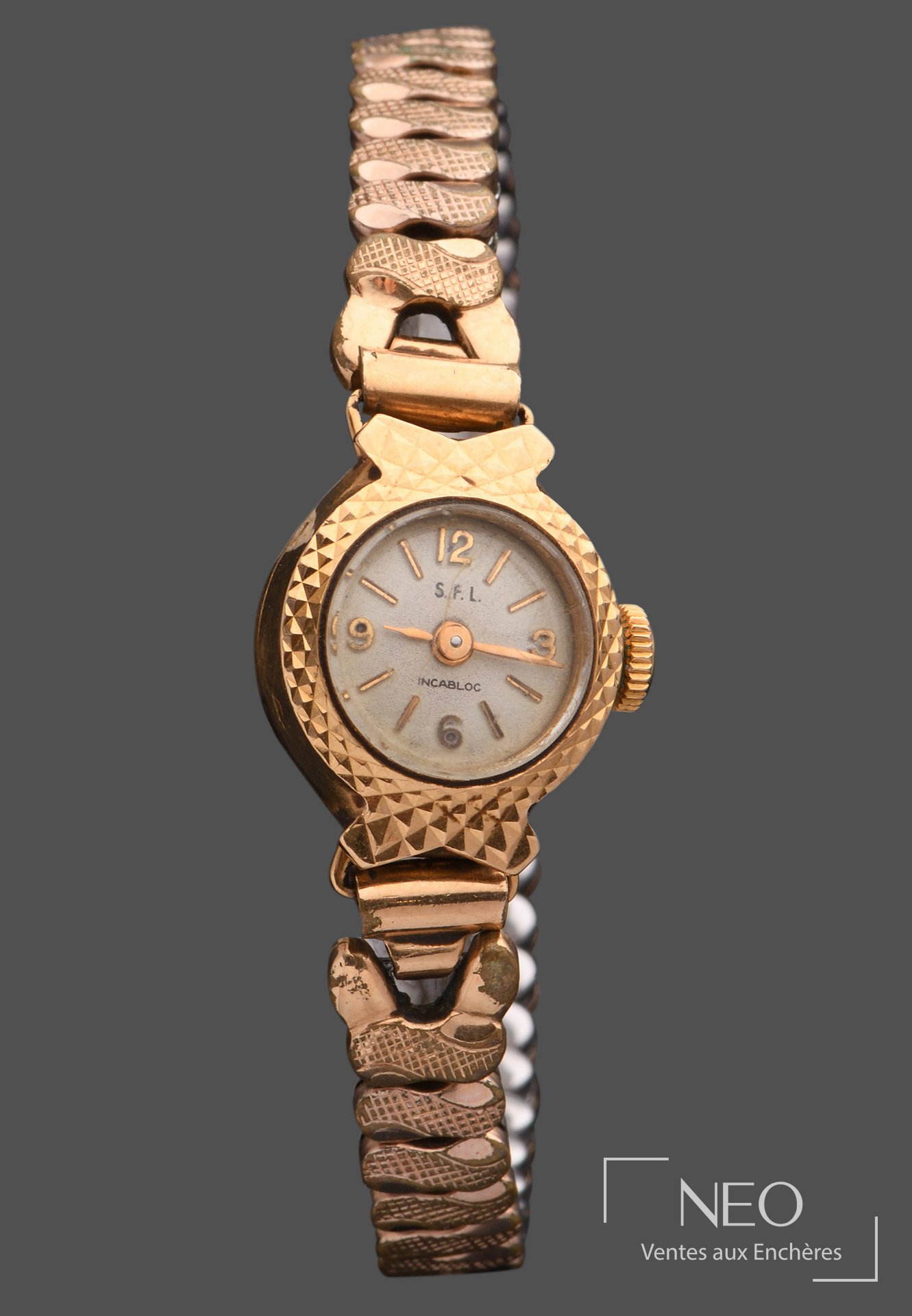 Montre bracelet SFL en or jaune