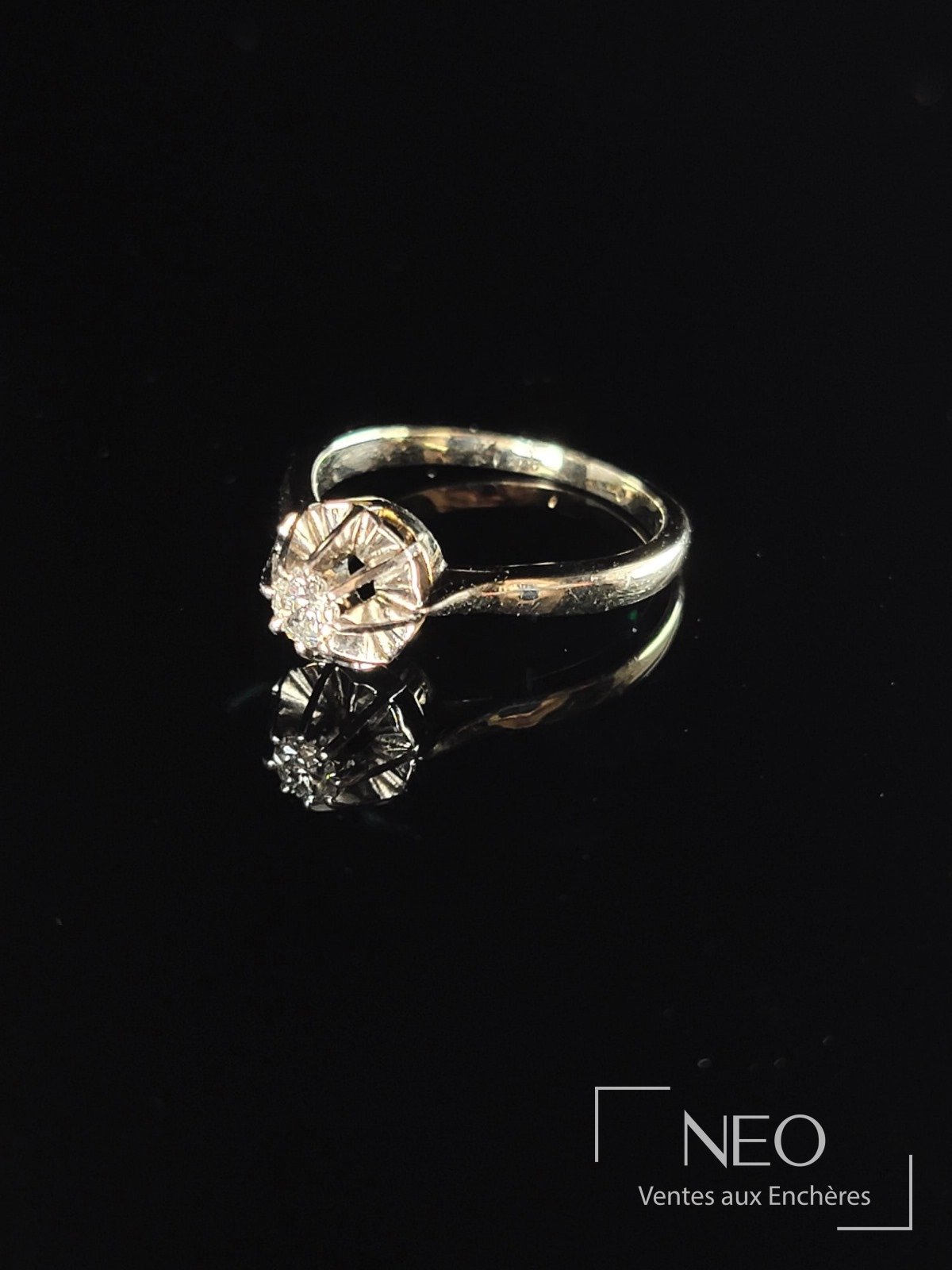 Solitaire en platine et or jaune 18 carats centré d&rsquo;un diamant