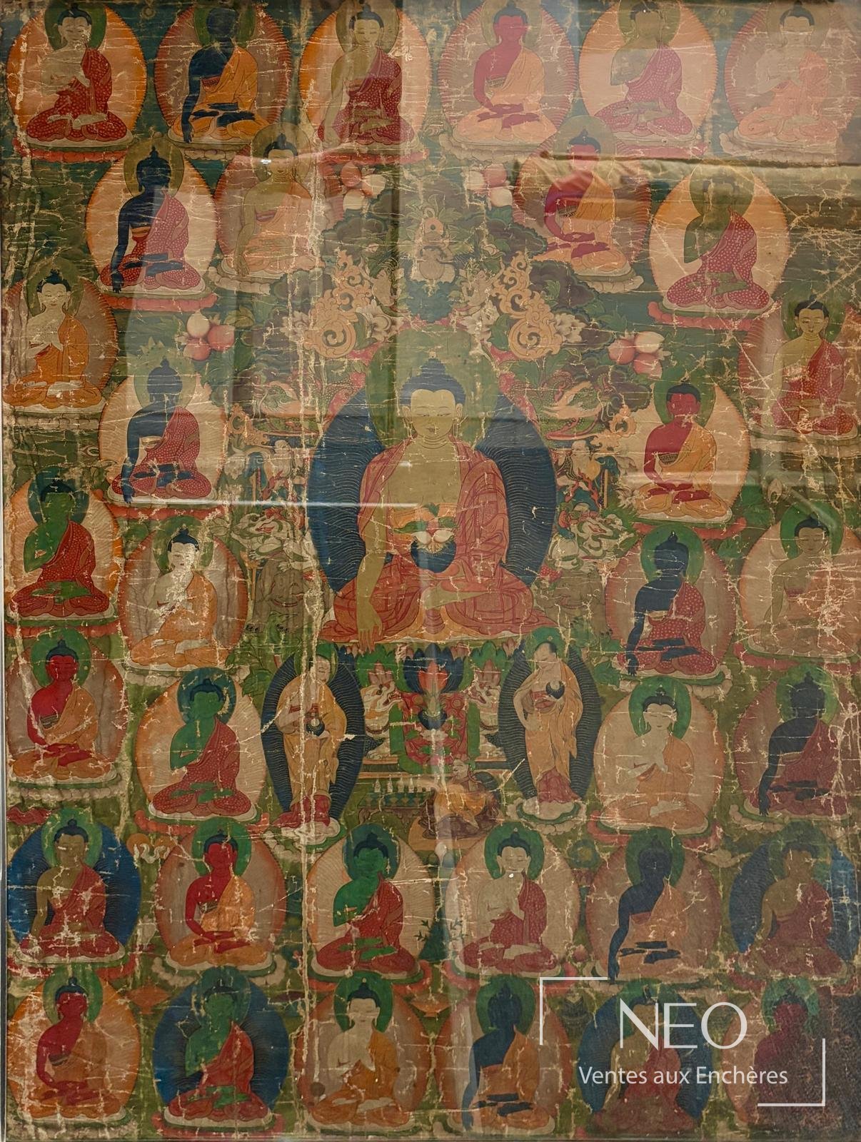 Thangka tibétain ancien représentant de nombreux bouddhas assis