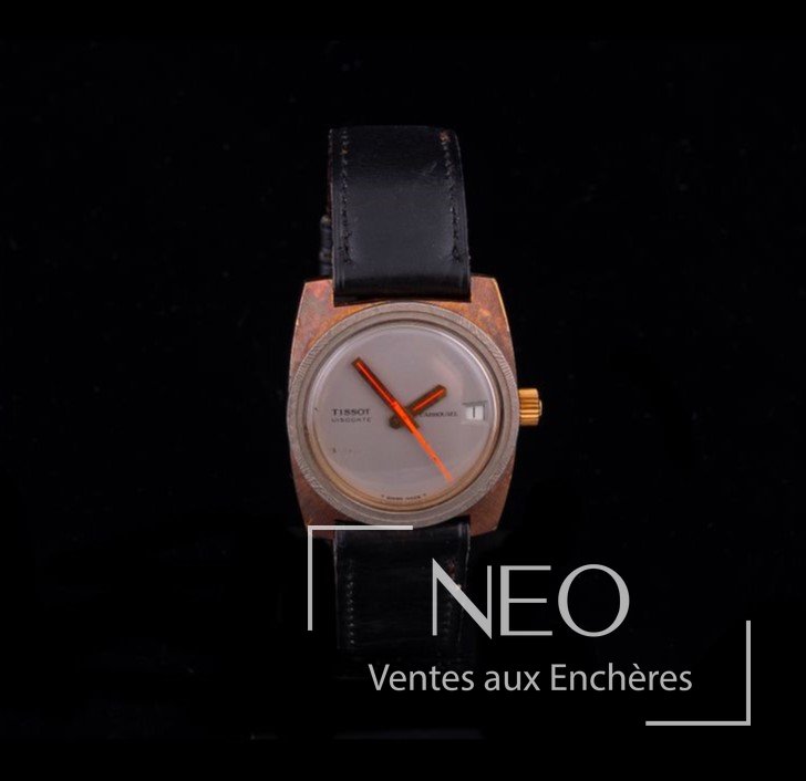Tissot montre de ville en métal doré à mouvement mécanique