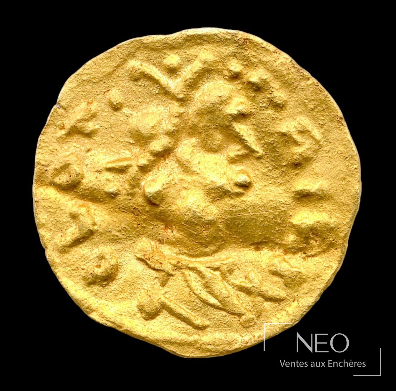 Monnaie d'or ancienne à flan irrégulier