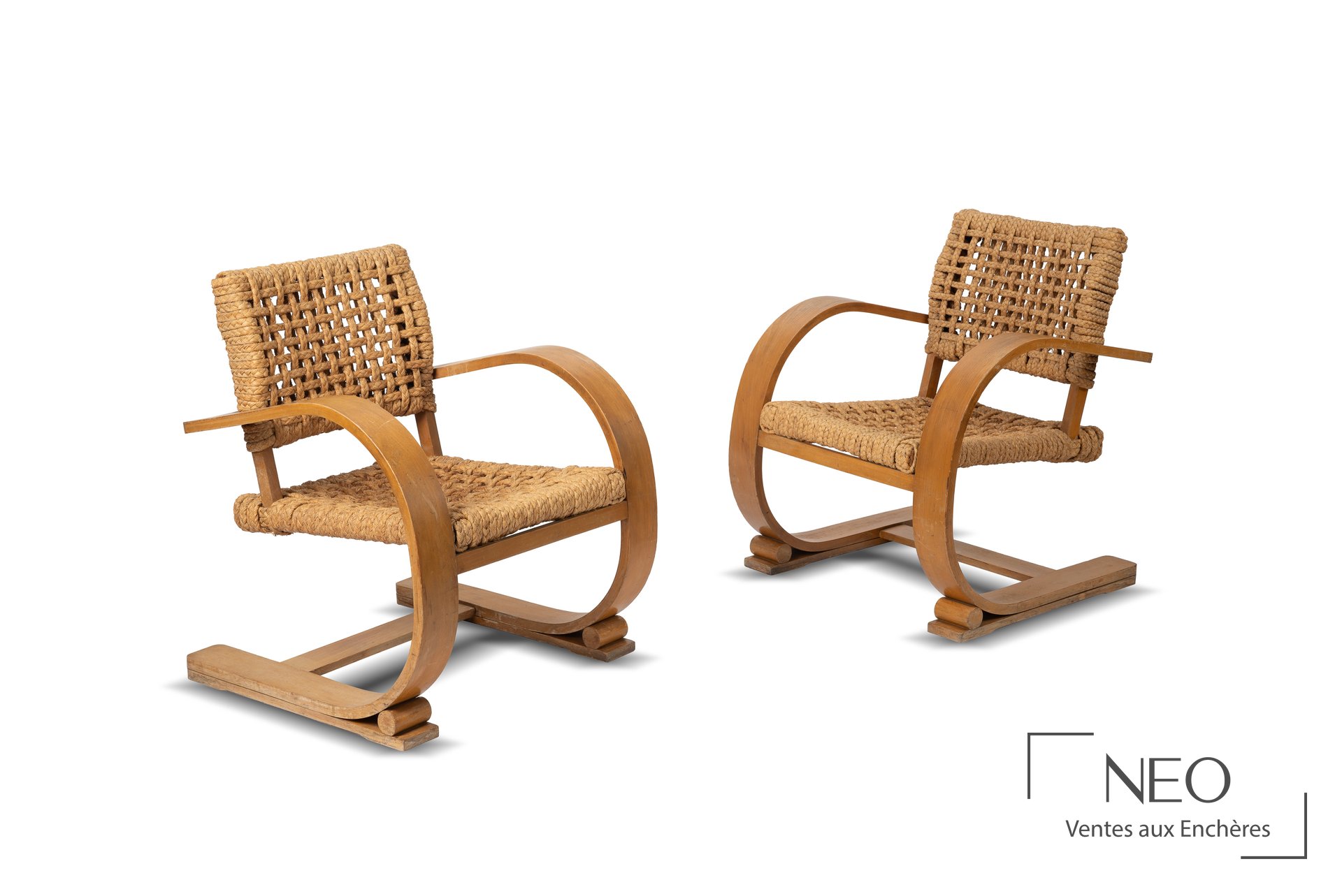 Vibo à Vesoul, paire de fauteuils en jonc tressé, circa 1950