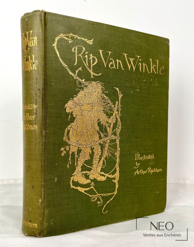 Reliure en tissu vert ornée de décors dorés et du titre Rip Van Winkle